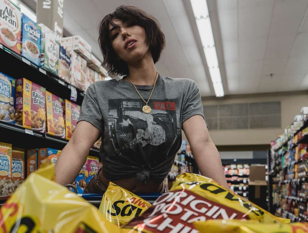 woman shopping for processed foods
